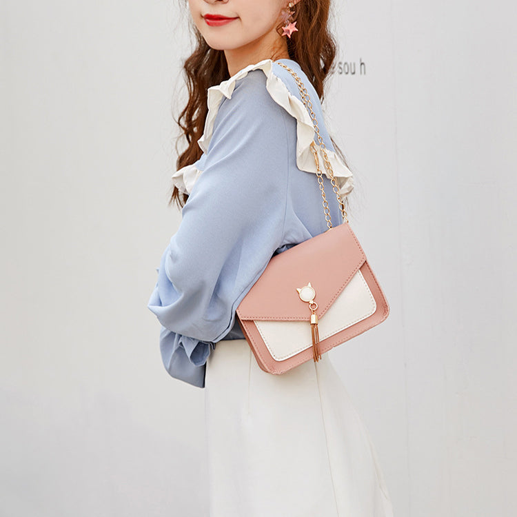 Small square crossbody bag with cat clasp