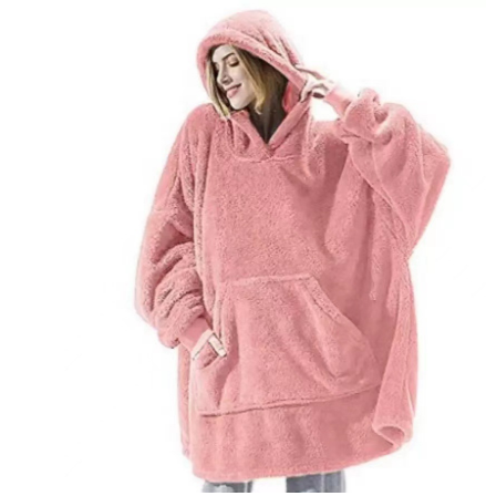 Person wearing oversized plush blanket hoodie